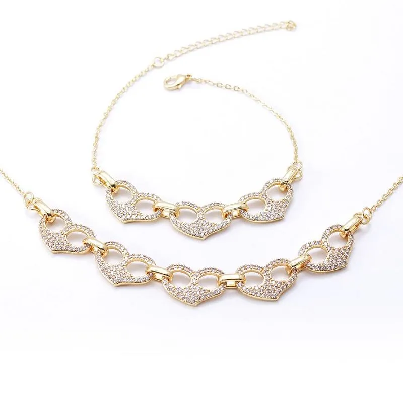 Set di gioielli con collana e braccialetto a forma di cuore
